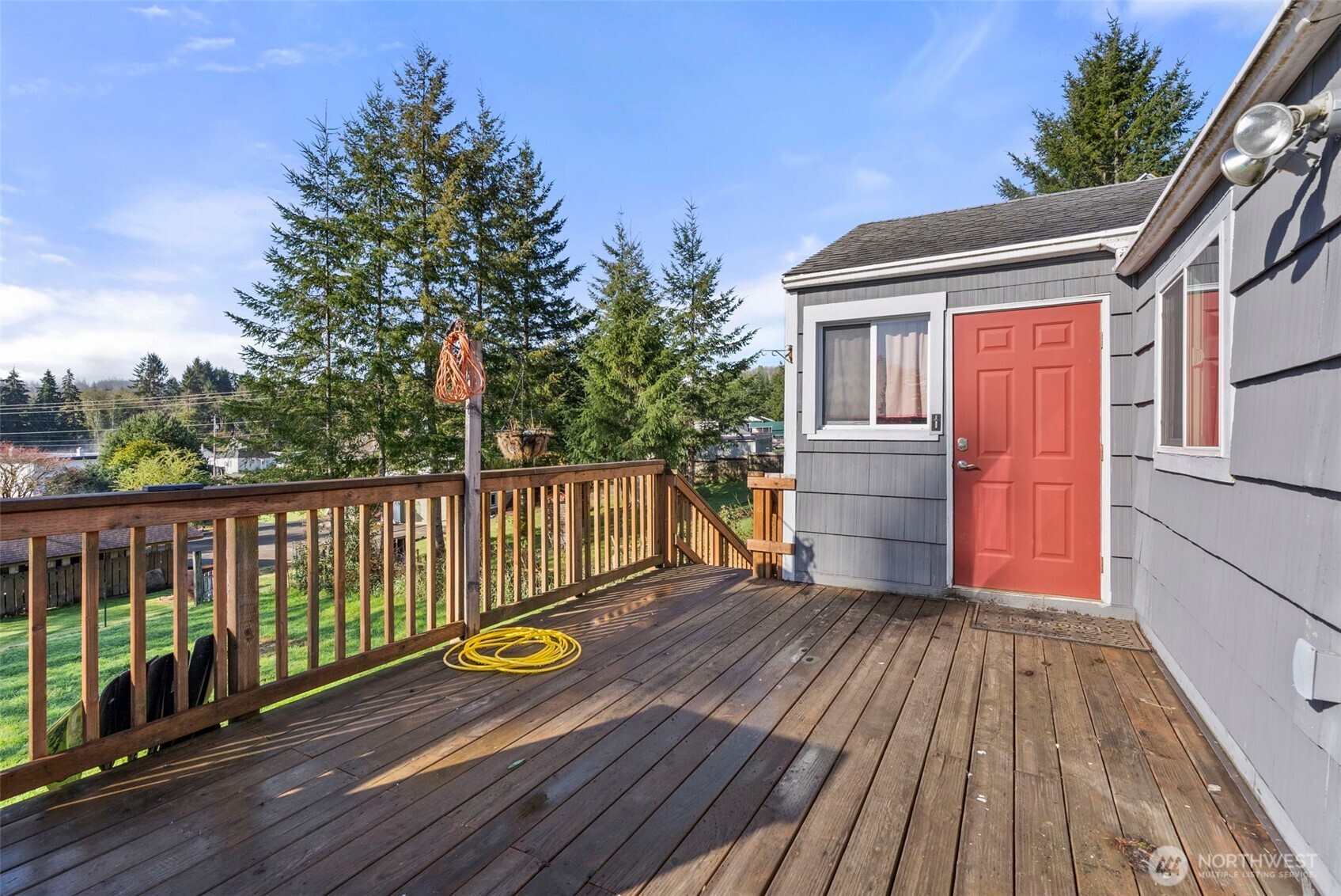 3306 Romane Road Raymond, WA 98577 - Photo 3 of 25 a view of balcony with wooden floor and fence