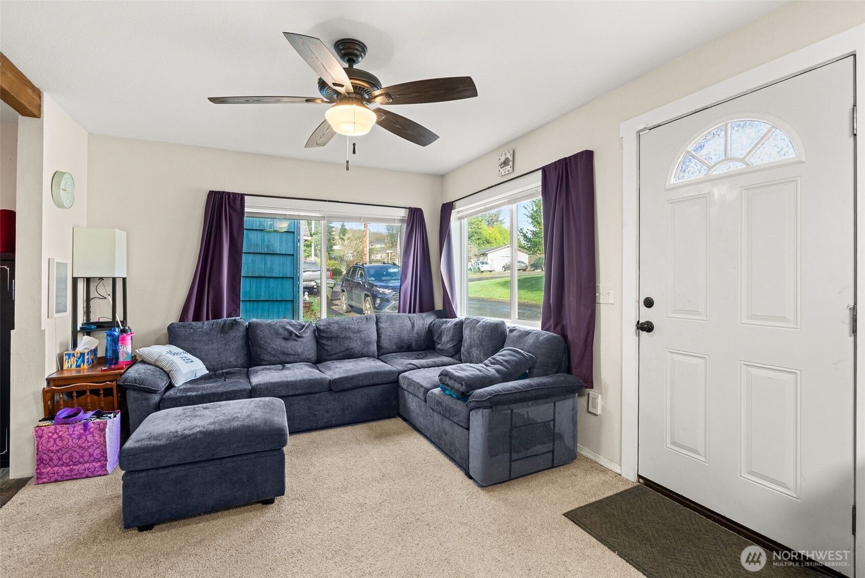 3306 Romane Road Raymond, WA 98577 - Photo 6 of 25 a living room with furniture and a large window