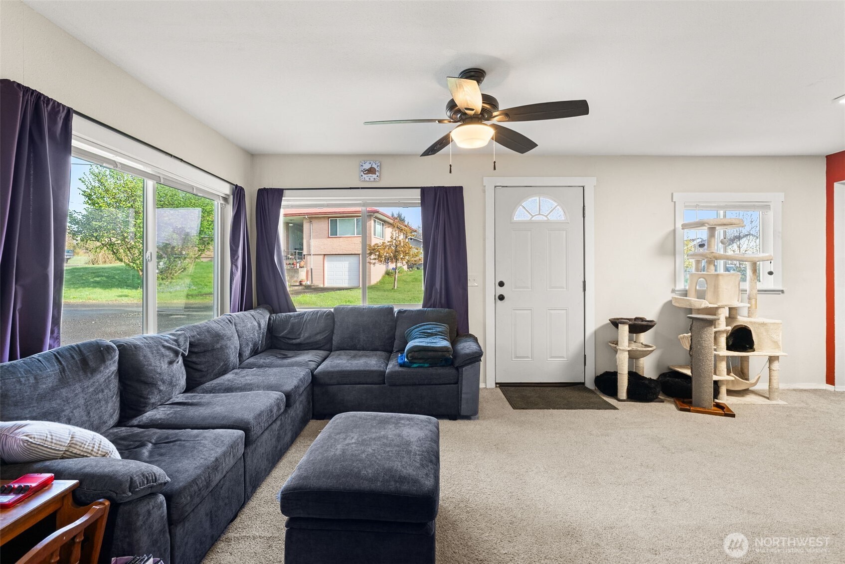 3306 Romane Road Raymond, WA 98577 - Photo 7 of 25 a living room with furniture and a large window