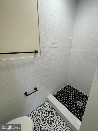 a bathroom with a toilet