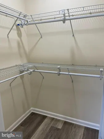 a view of a room with racks on the wall