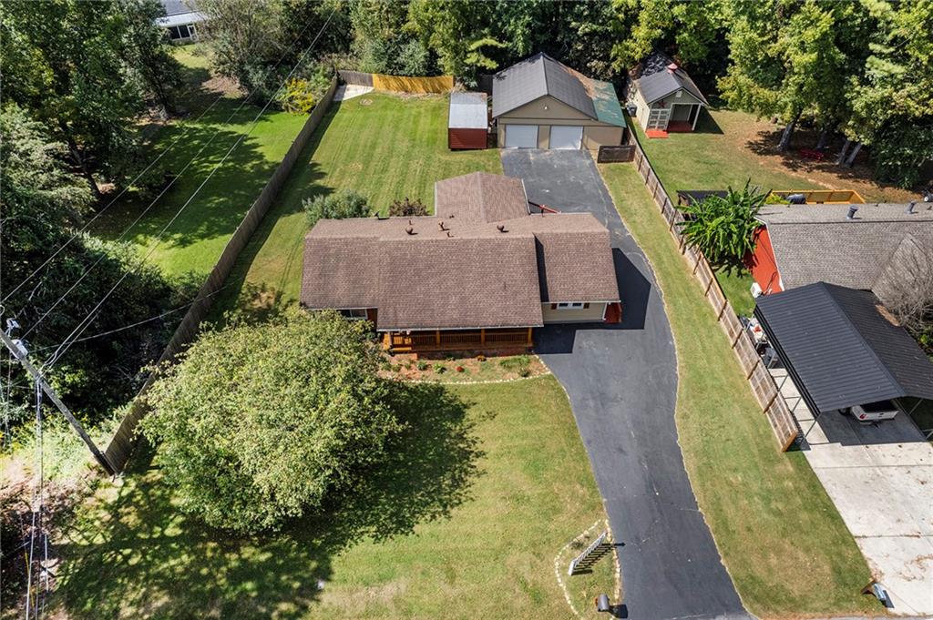 an aerial view of a house with a garden