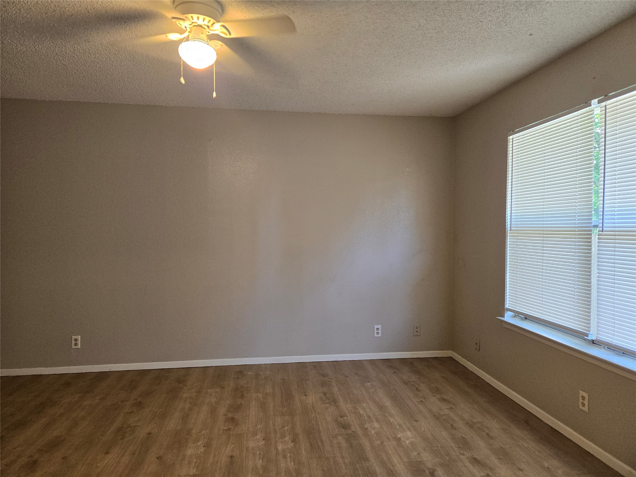1011 Ridgemont Street Round Rock, TX 78664 - Photo 12 of 14 an empty room with a empty space and a window