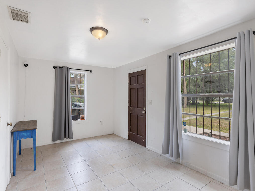 902 Boston Avenue Fort Pierce, FL 34950 - Photo 15 of 34 a view of an empty room with a window