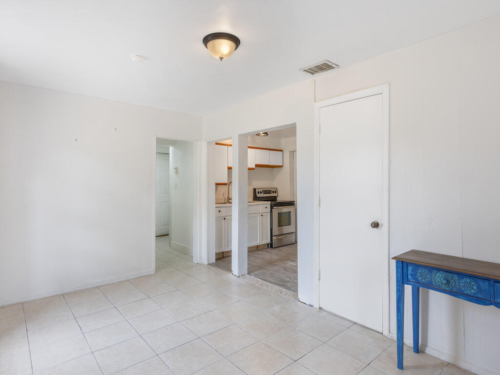 902 Boston Avenue Fort Pierce, FL 34950 - Photo 18 of 34 a view of walk in closet with window