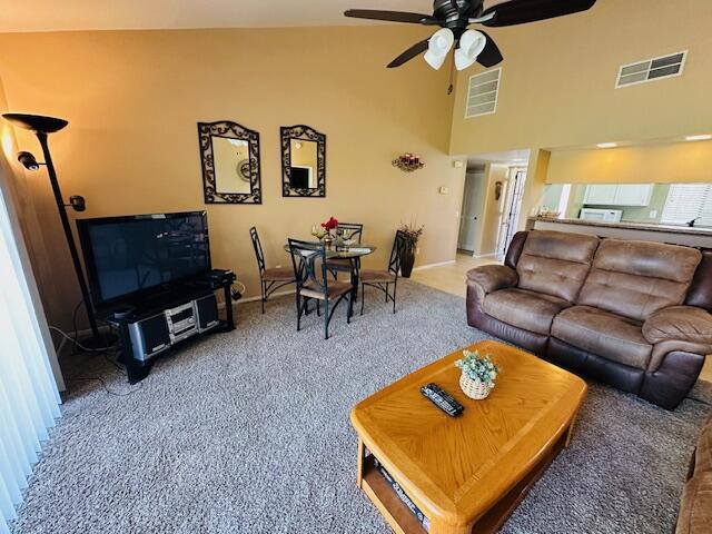 41450 Inverness Way Palm Desert, CA 92211 - Photo 1 of 19 a living room with furniture and a flat screen tv