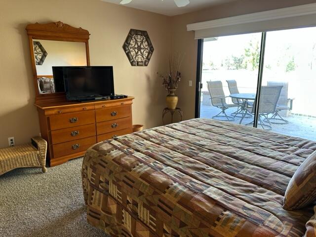 41450 Inverness Way Palm Desert, CA 92211 - Photo 13 of 19 a bedroom with a bed and a flat screen tv