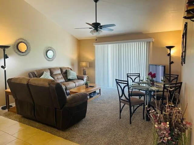 a living room with furniture and a window
