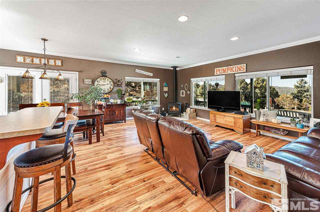 3650 Palisade Road Reno, NV 89521 - Photo 7 of 25 a living room with furniture and a flat screen tv