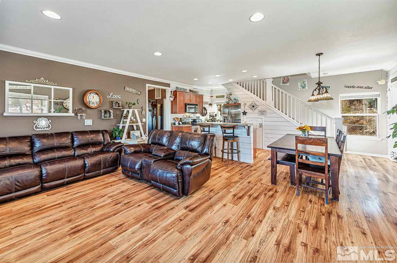 3650 Palisade Road Reno, NV 89521 - Photo 9 of 25 a living room with furniture and wooden floor