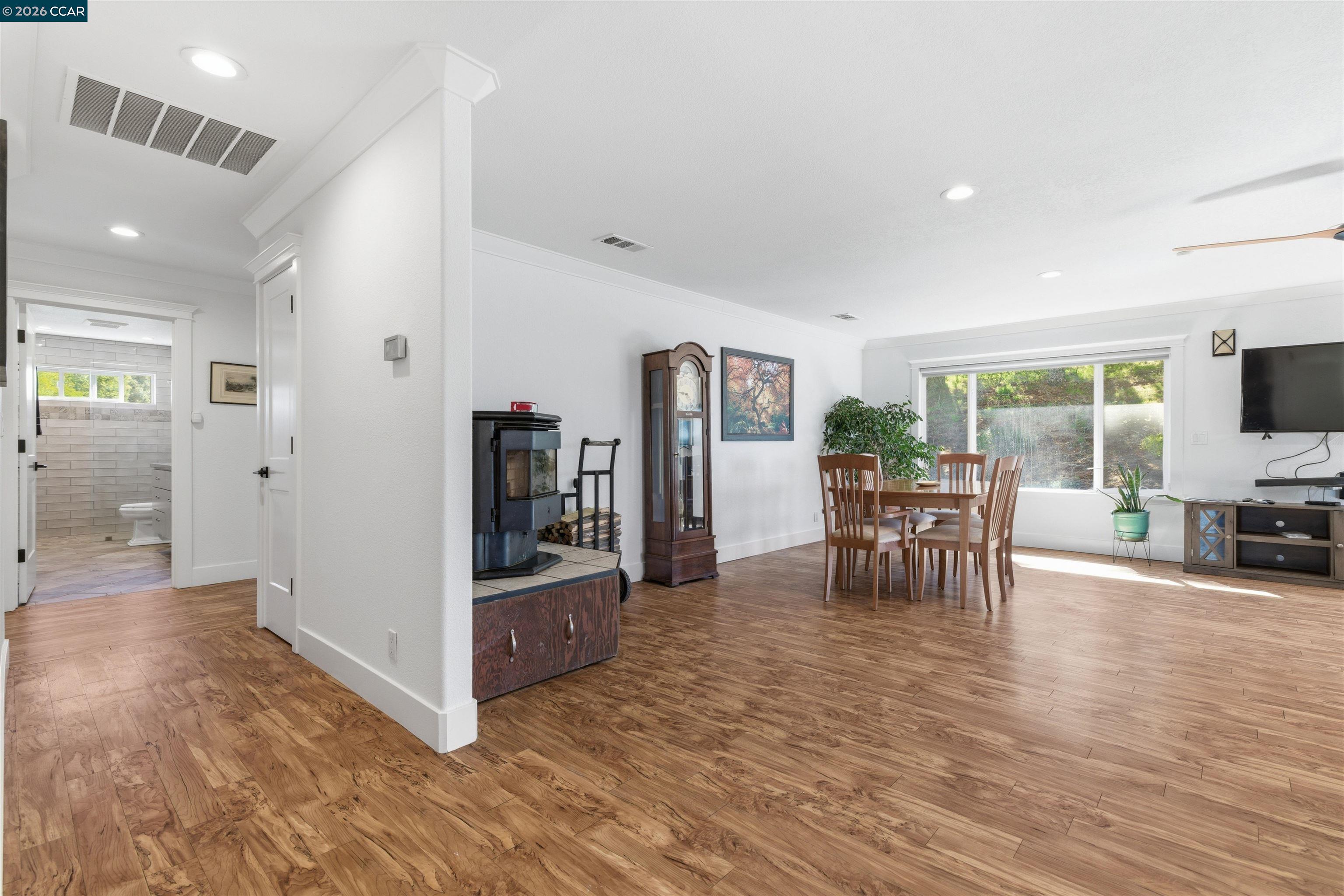 9530 Morgan Territory Road Livermore, CA 94551 - Photo 7 of 55 a view of a livingroom with furniture and a flat screen tv
