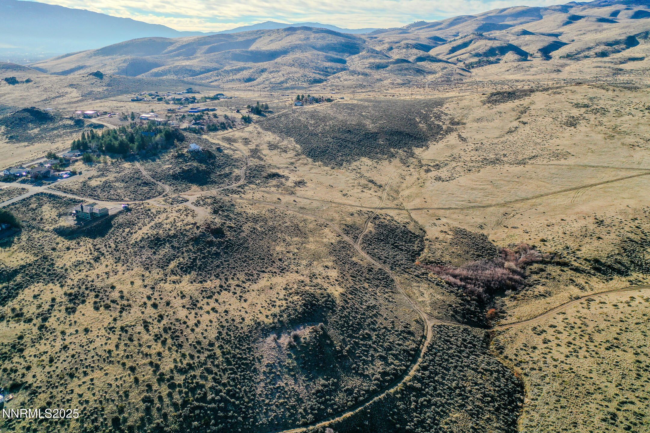 5250 Mason Road Reno, NV 89506 - Photo 8 of 9 a view of a yard with wooden fence
