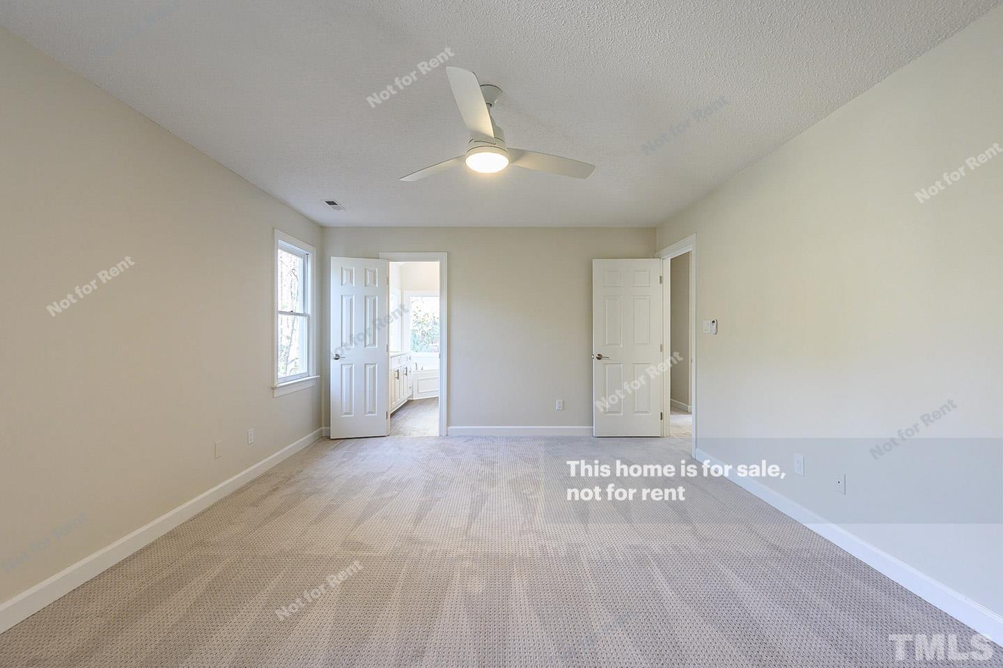 203 Parkgate Drive Cary, NC 27519 - Photo 12 of 31 a view of an empty room and window