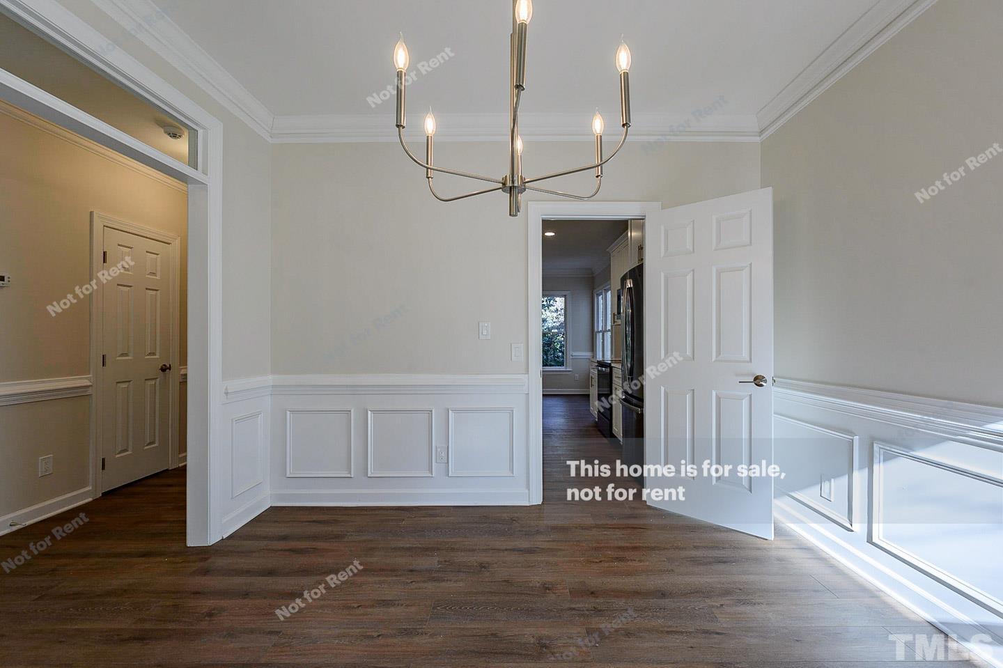 203 Parkgate Drive Cary, NC 27519 - Photo 16 of 31 a view of a livingroom with wooden floor