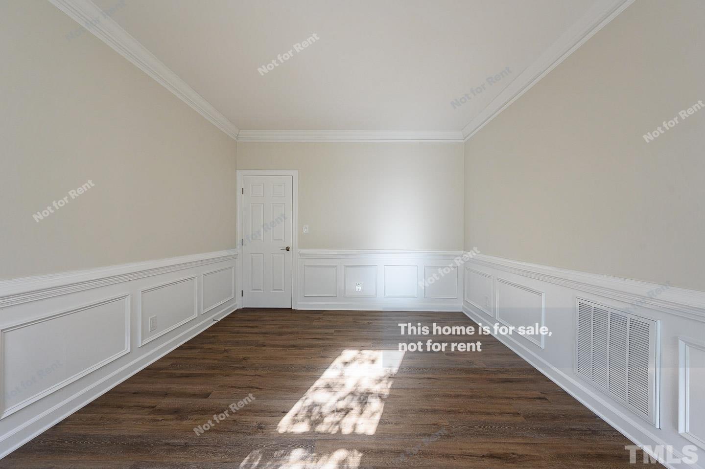 203 Parkgate Drive Cary, NC 27519 - Photo 18 of 31 a view of an empty room and wooden floor