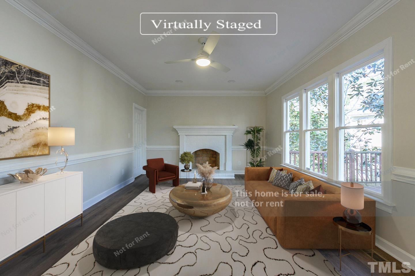 203 Parkgate Drive Cary, NC 27519 - Photo 2 of 31 a living room with furniture and a fireplace