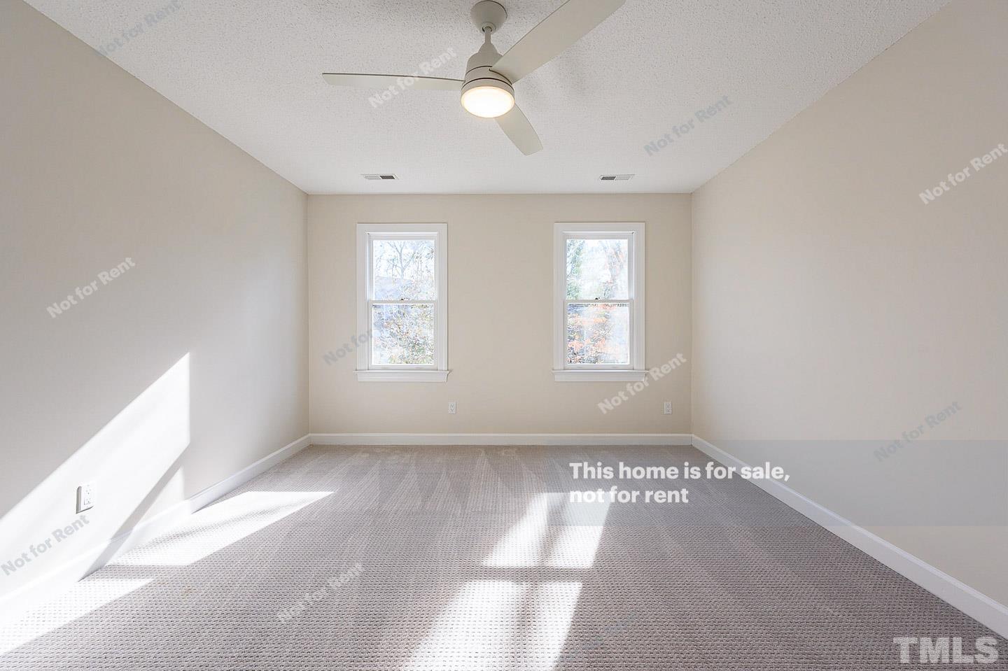203 Parkgate Drive Cary, NC 27519 - Photo 23 of 31 wooden floor in an empty room with a window