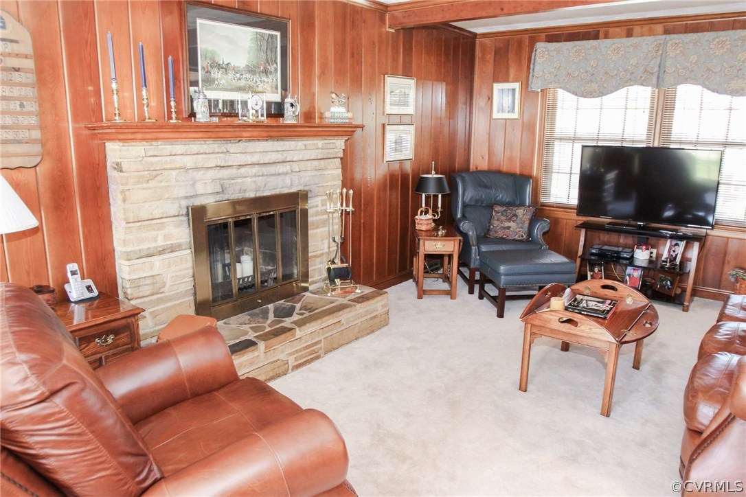 3620 Falstone Road North Chesterfield, VA 23234 - Photo 16 of 42 a living room with furniture a fireplace and a flat screen tv