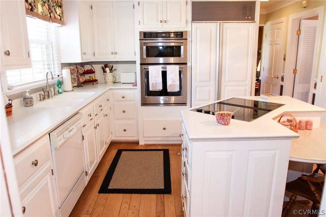 3620 Falstone Road North Chesterfield, VA 23234 - Photo 10 of 42 a kitchen with stainless steel appliances a microwave a sink and cabinets