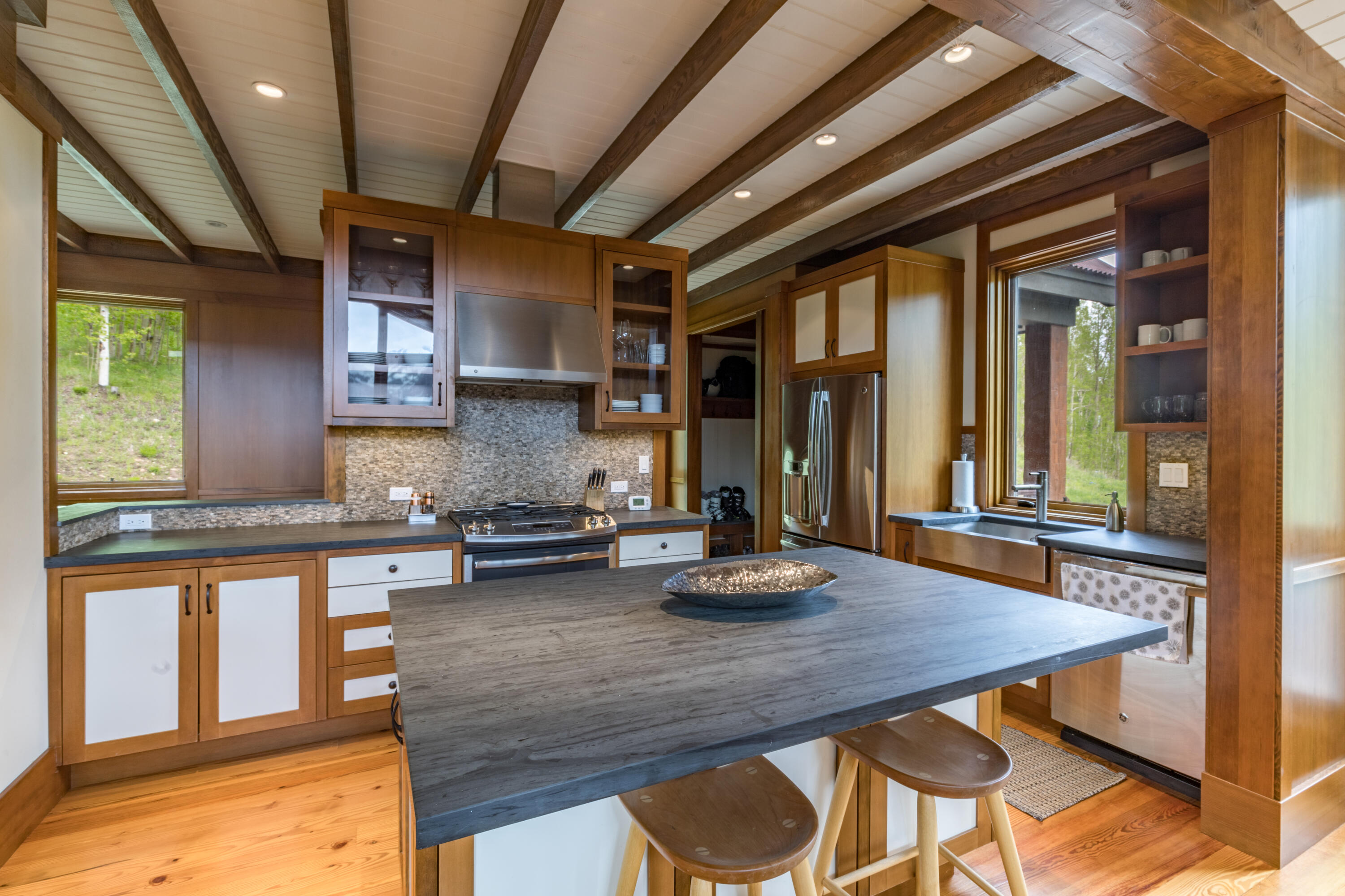 2737 Little Cone Ranch Road Placerville, CO 81430 - Photo 20 of 57 a kitchen with sink a counter and chairs