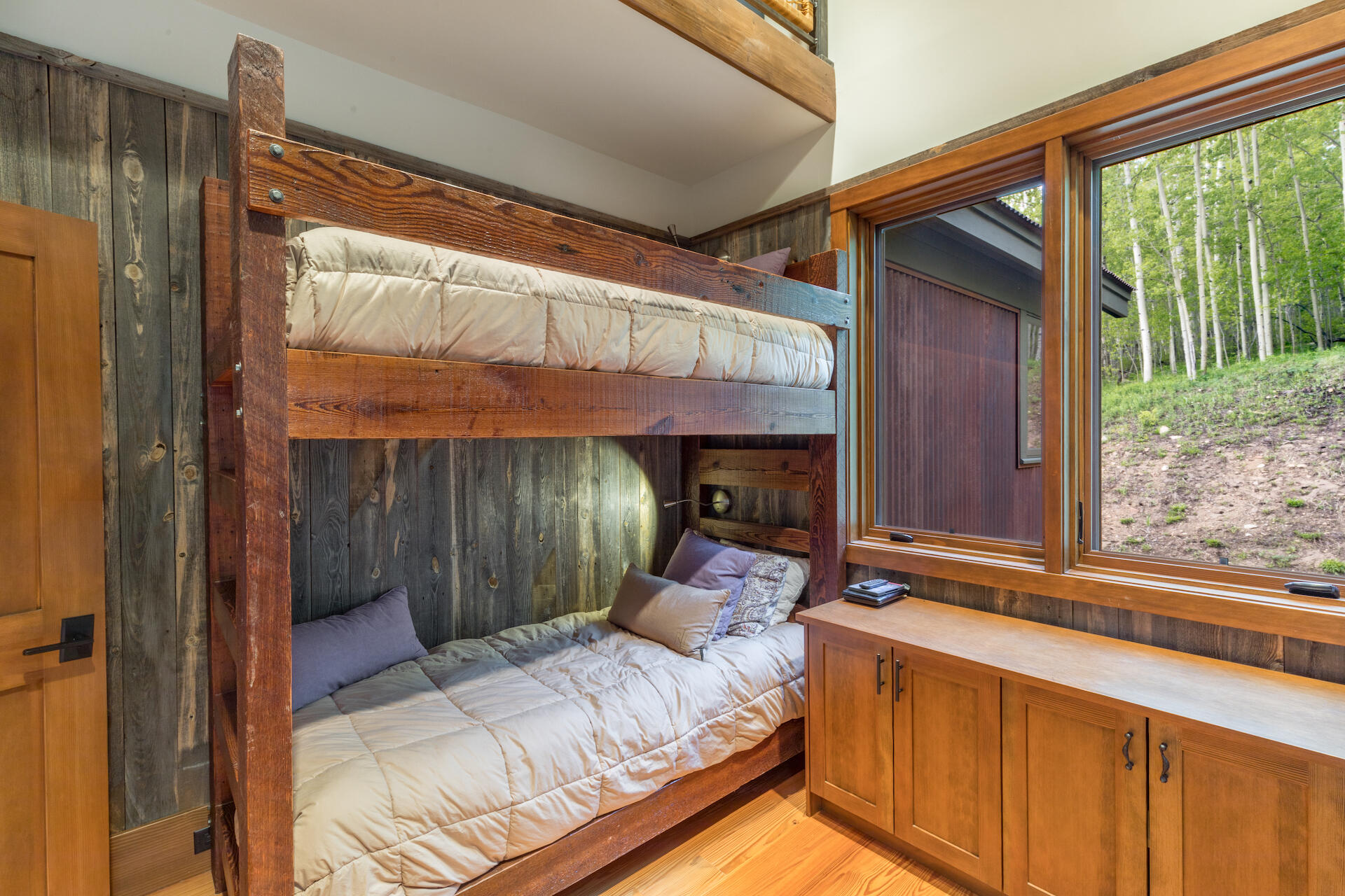 2737 Little Cone Ranch Road Placerville, CO 81430 - Photo 32 of 57 a bed room with a bed and a large window
