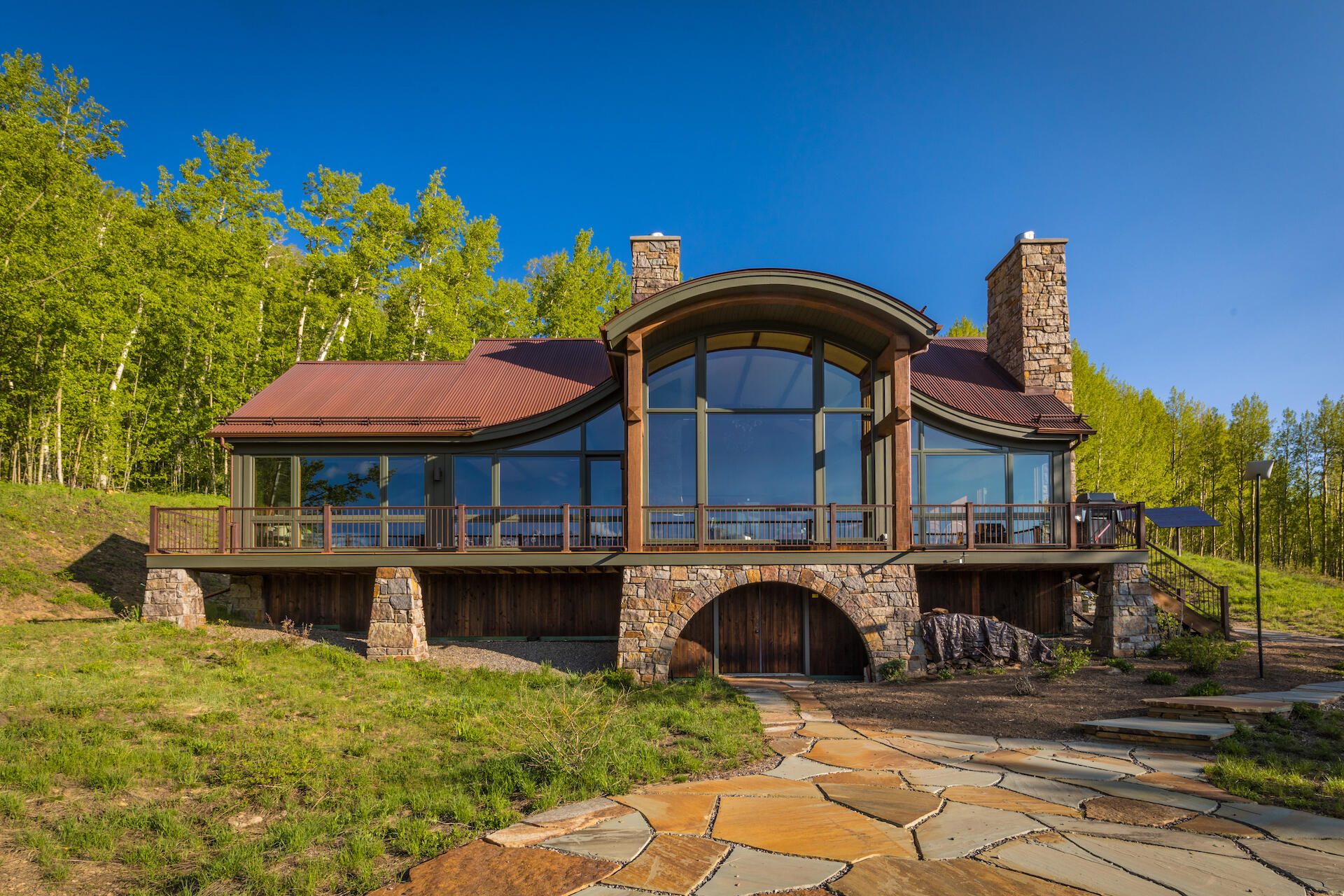 2737 Little Cone Ranch Road Placerville, CO 81430 - Photo 5 of 57 a front view of a house with swimming pool