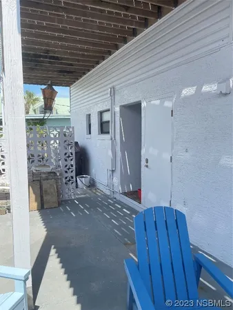 a view of a deck in front of house