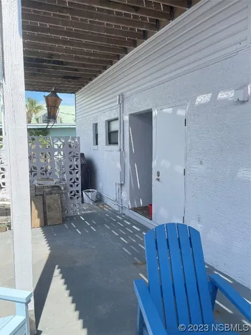 a view of a deck in front of house