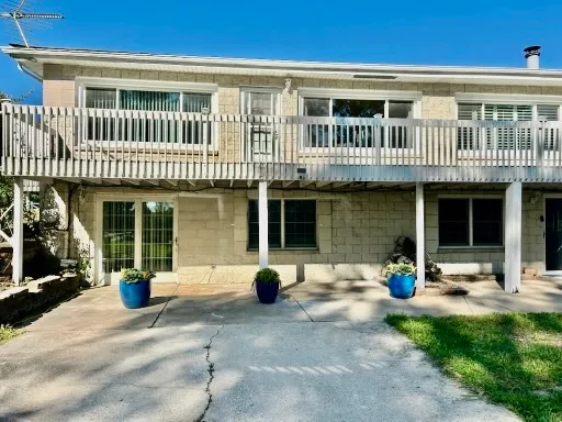 a front view of a house with a patio