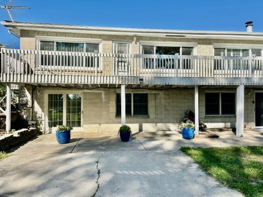 a front view of a house with a patio