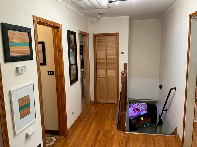 a view of living room with furniture and flat screen tv