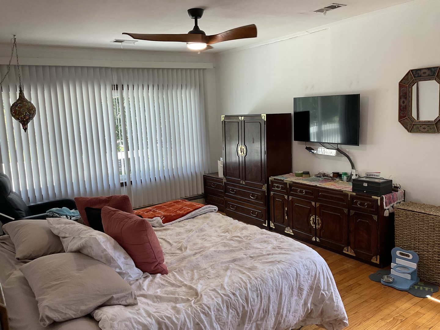 2741 223rd Street Chicago Heights, IL 60411 - Photo 17 of 41 a bedroom with a bed and dresser with mirror