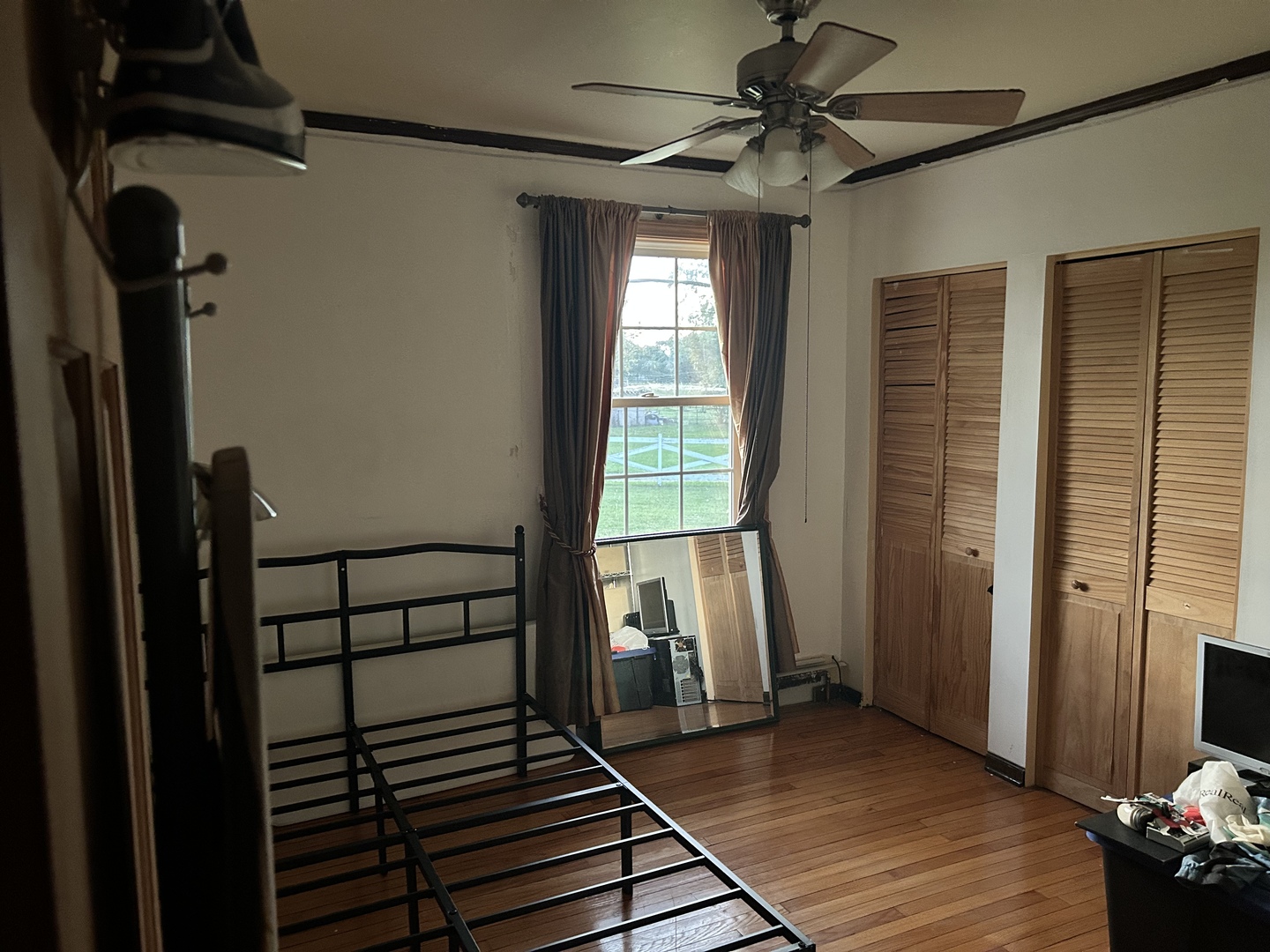 2741 223rd Street Chicago Heights, IL 60411 - Photo 40 of 41 a view of a livingroom with wooden floor and a window