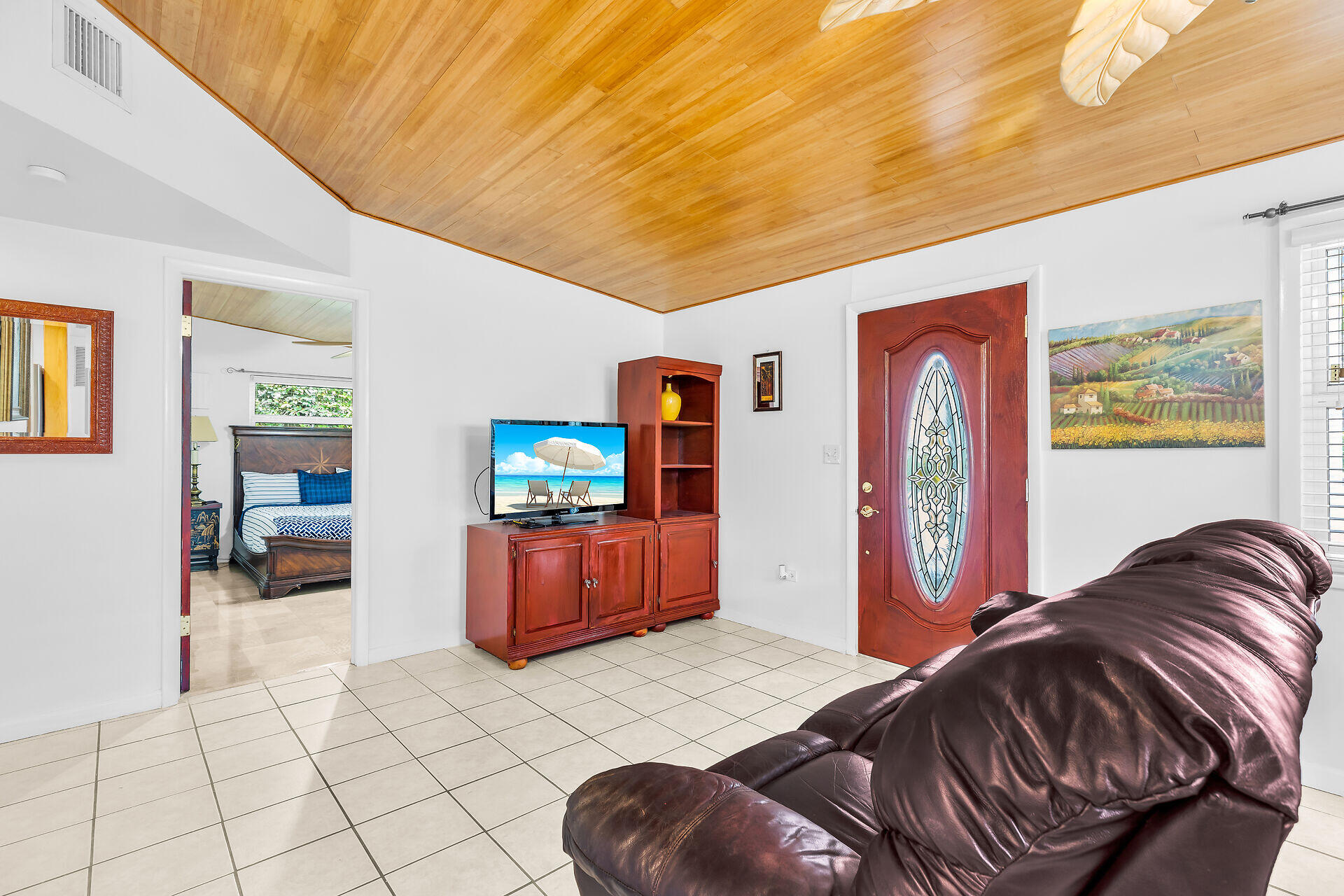 13 Bass Avenue Key Largo, FL 33037 - Photo 6 of 43 a bedroom with a bed and dresser