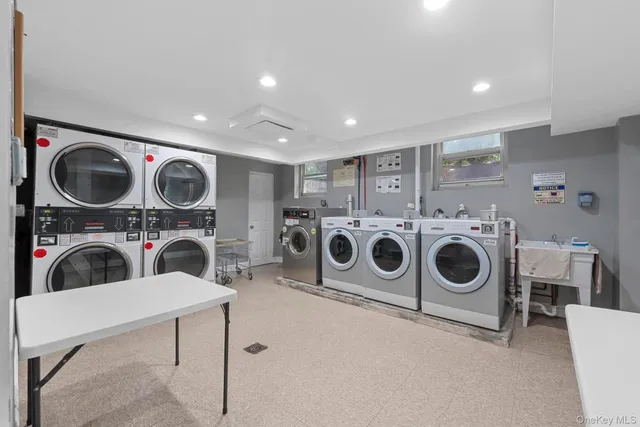 a utility room with dryer washer and dryer