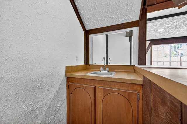 a view of a hallway with closet