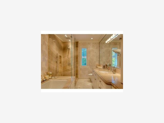 238 Harvard Road San Mateo, CA 94402 - Photo 8 of 9 a bathroom with a sink and a mirror