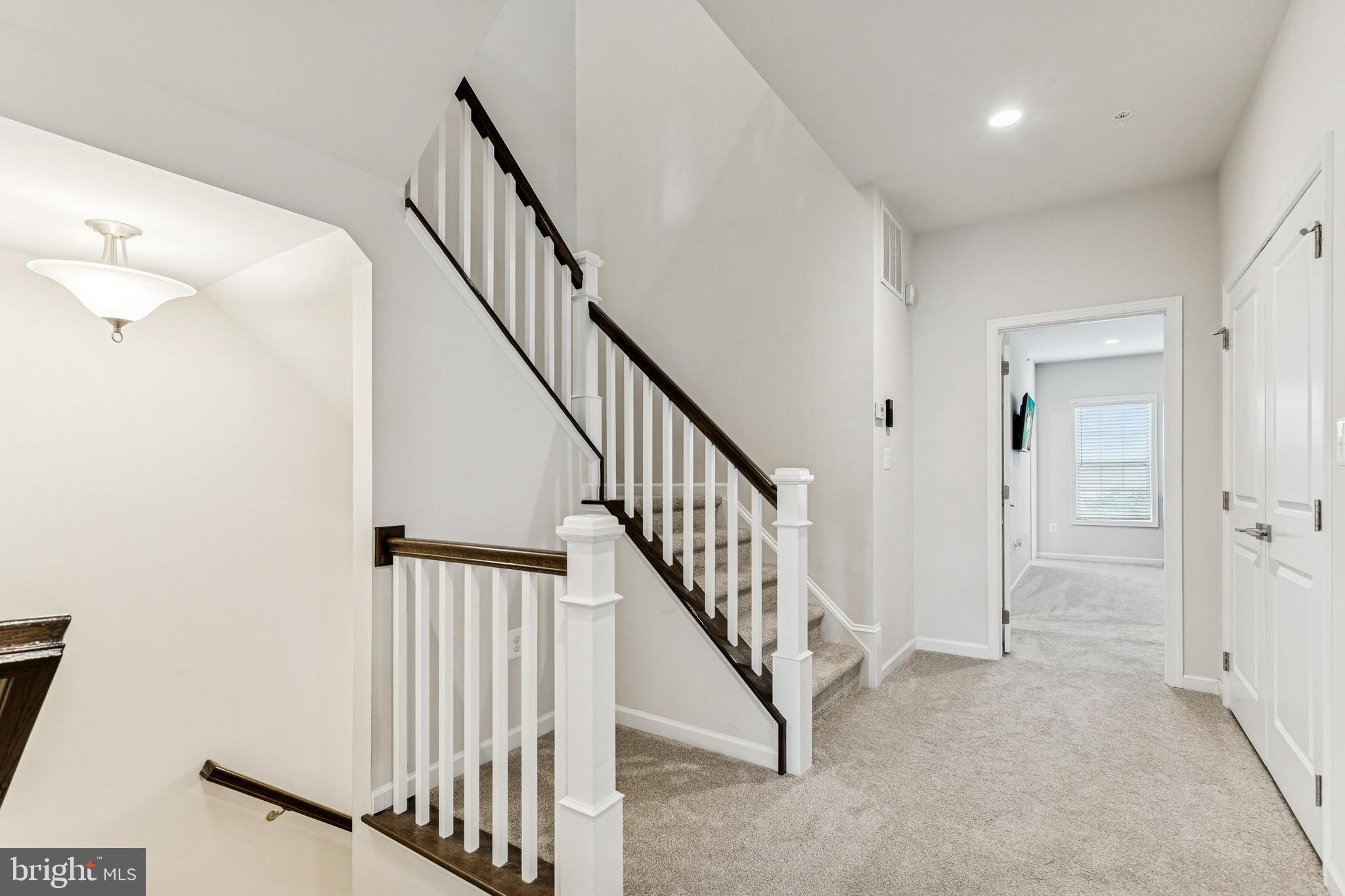 23747 Hopewell Manor Terrace Ashburn, VA 20148 - Photo 20 of 34 Hallway & Stairs