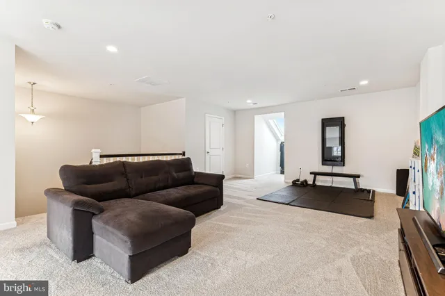 a living room with furniture and a couch