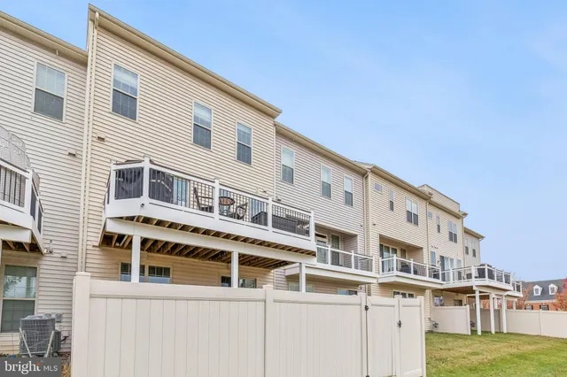 a view of a backyard with plants