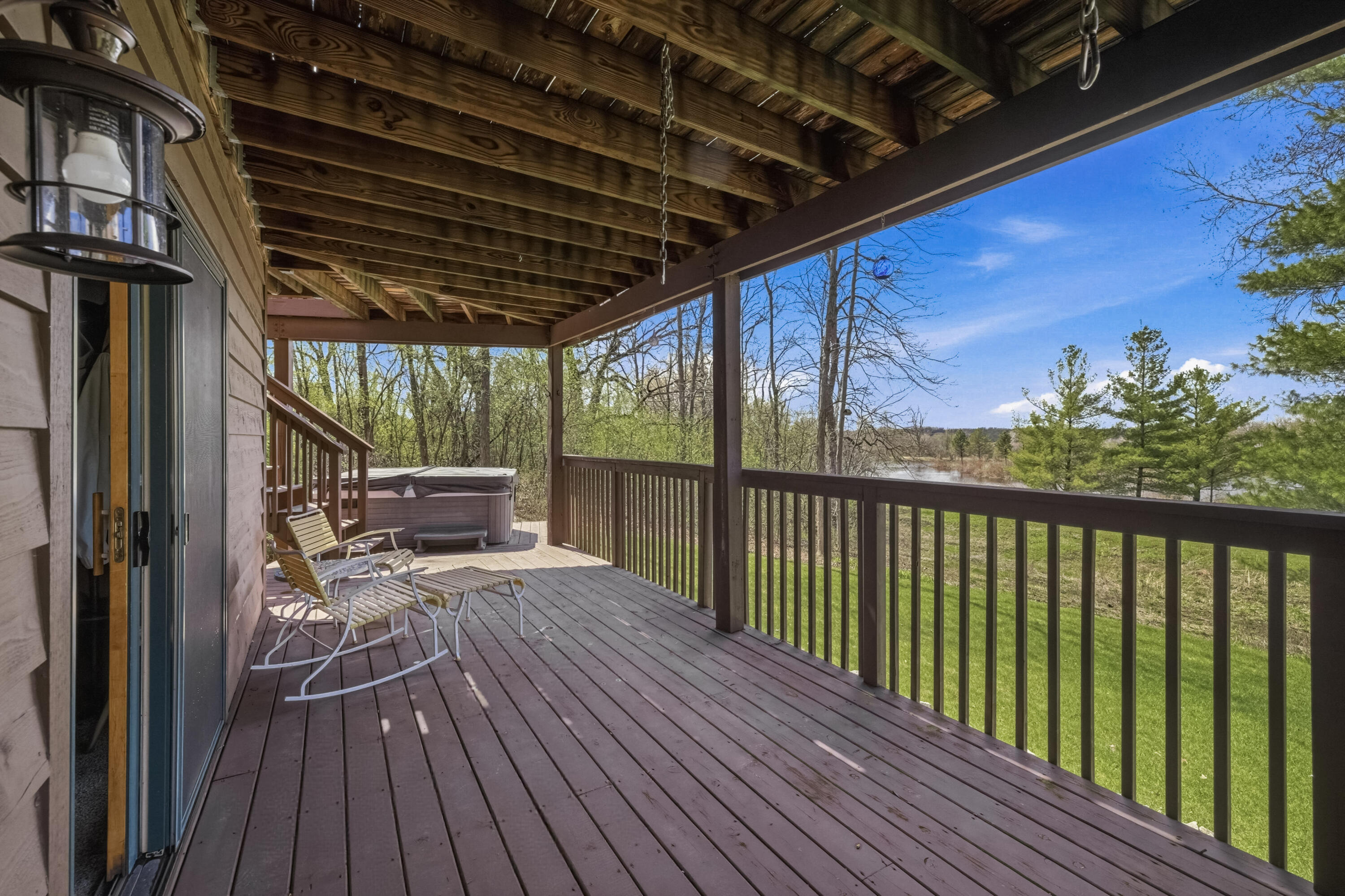 6635 Deerpath Road Lyons, WI 53147 - Photo 28 of 32 Deck with hot tub and views!