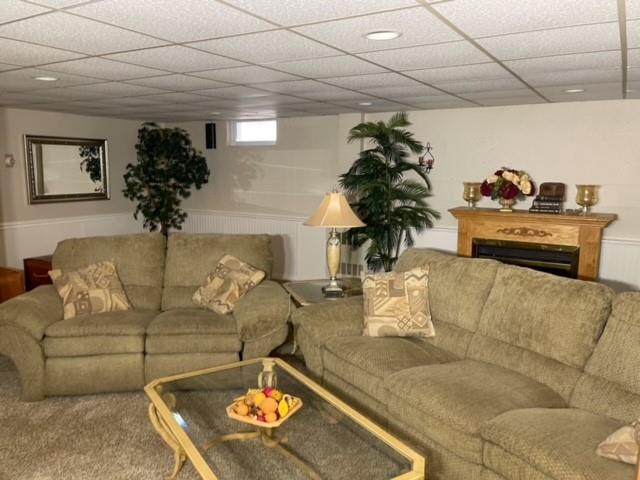 8243 Lamor Road Mercer, PA 16137 - Photo 17 of 25 a living room with furniture and flowers