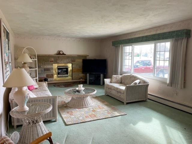 8243 Lamor Road Mercer, PA 16137 - Photo 6 of 25 a living room with furniture and a fireplace
