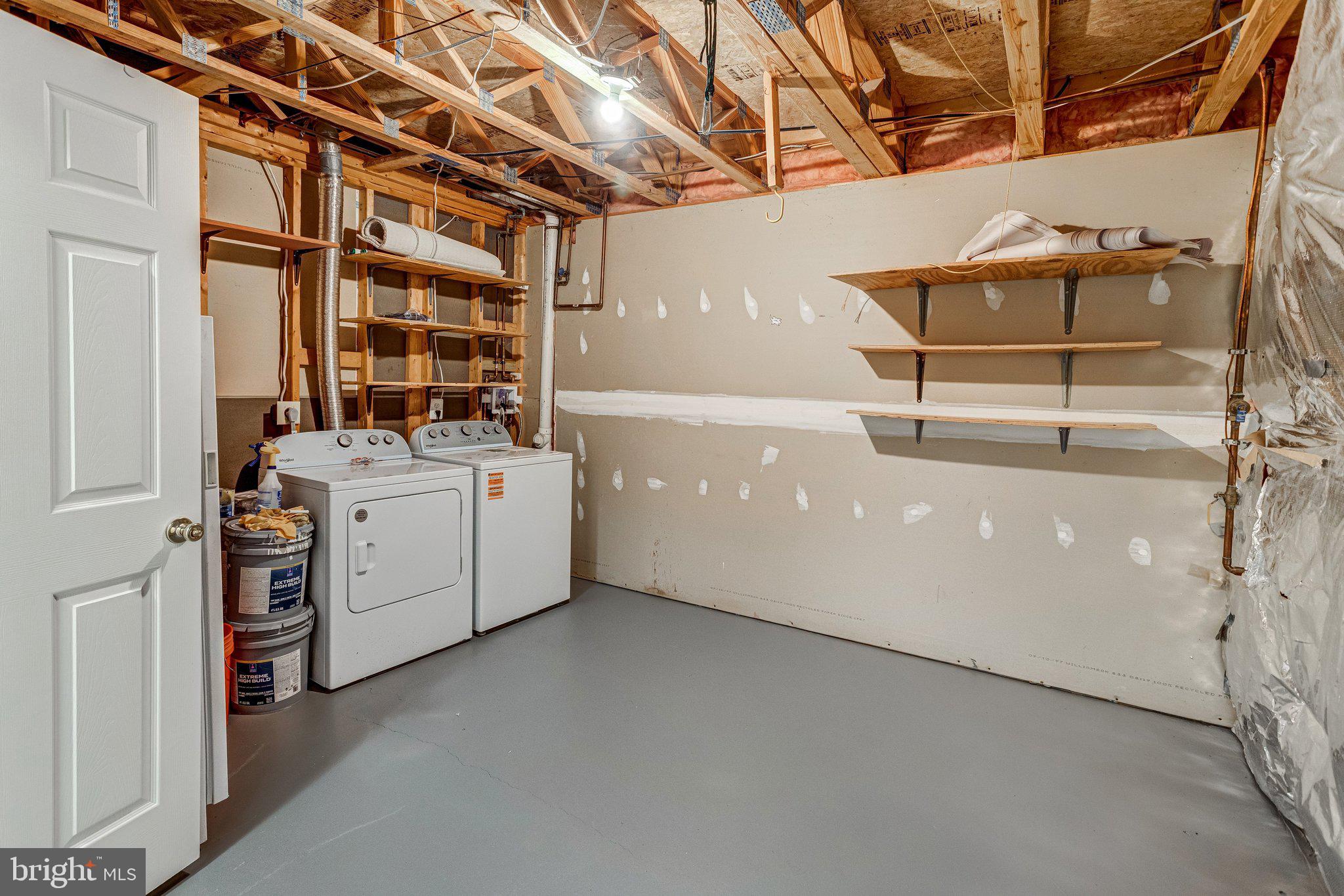 6489 McCoy Road Centreville, VA 20121 - Photo 22 of 34 Spacious laundry area with shelving.