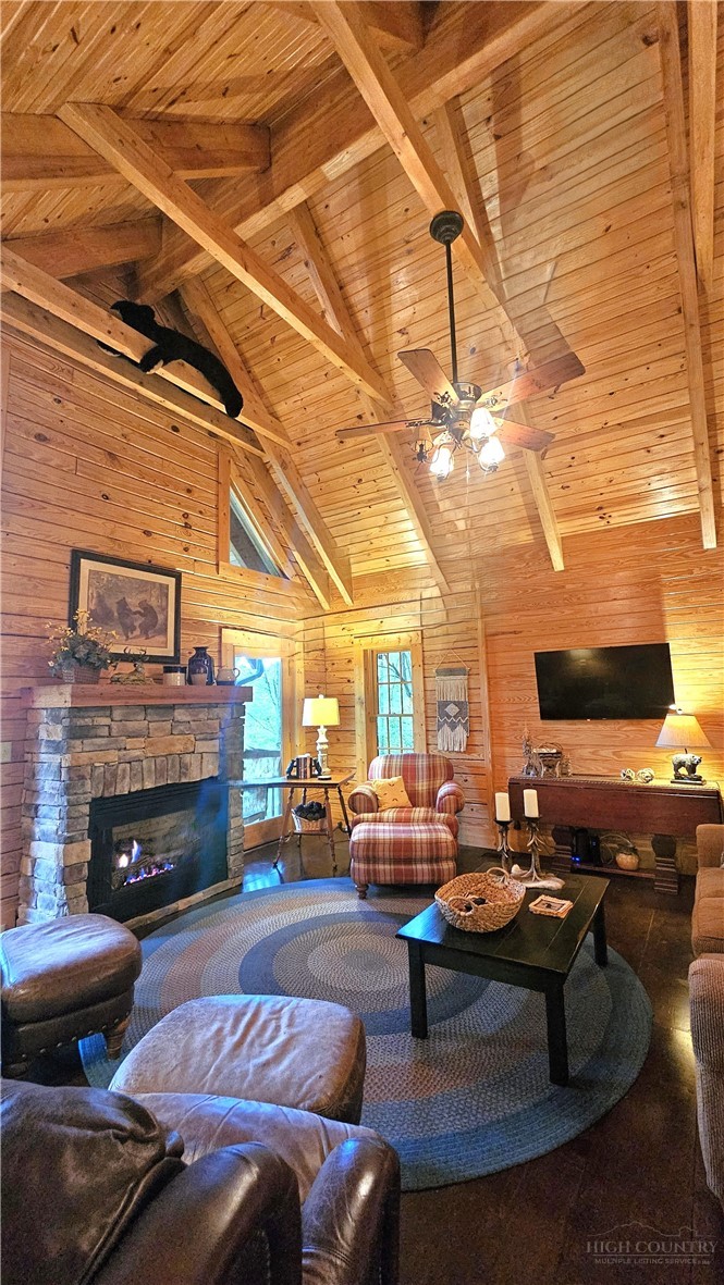 3043 Junaluska Road Boone, NC 28607 - Photo 18 of 49 a living room with fireplace furniture and a fireplace