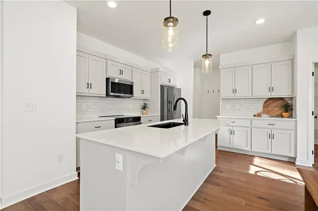 $409,950 | 408 Woodview Drive, Raymore, MO 64083