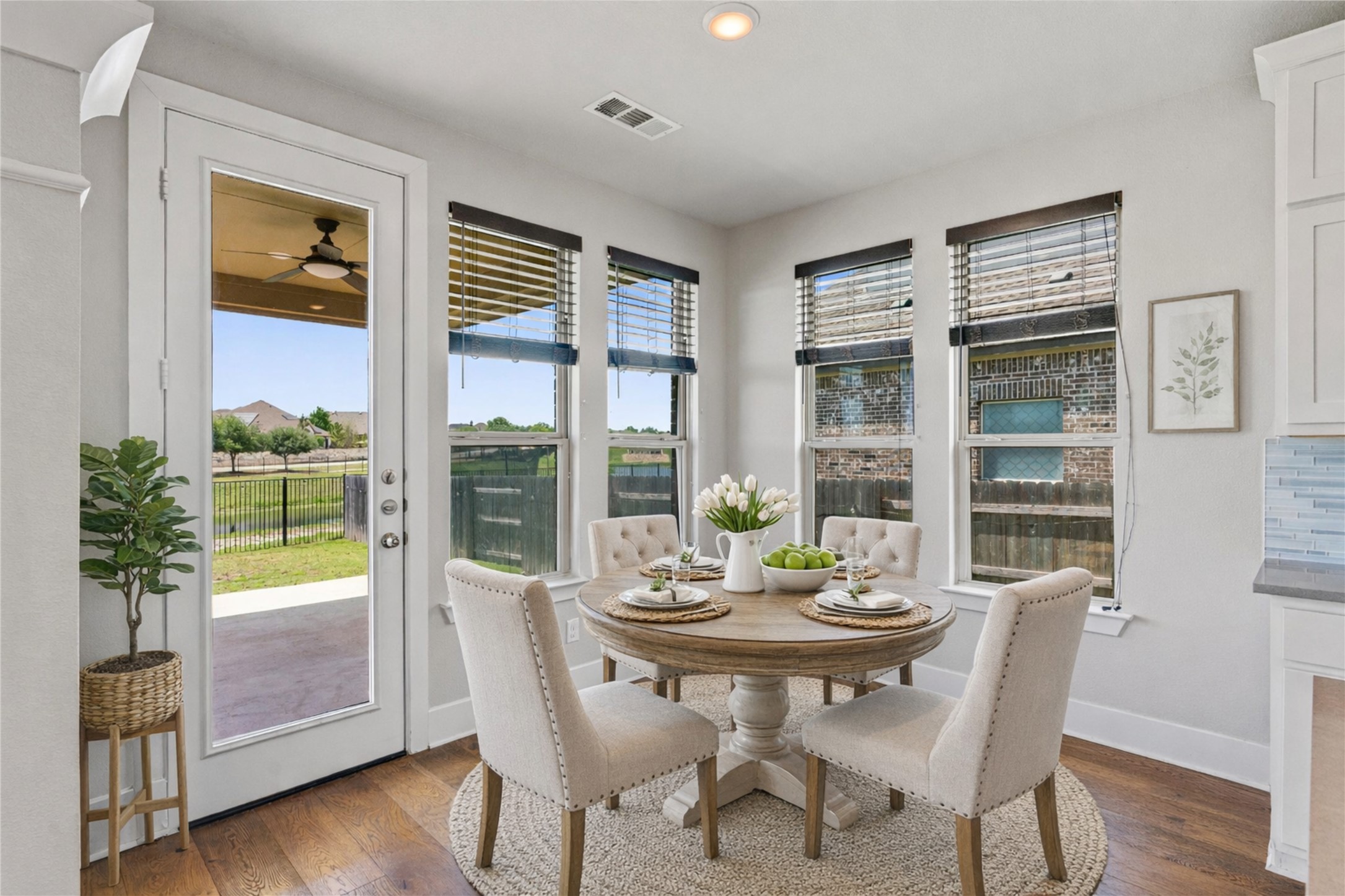 108 Rio Vista Drive Georgetown, TX 78626 - Photo 15 of 40 a view of a dining room with furniture window and wooden floor