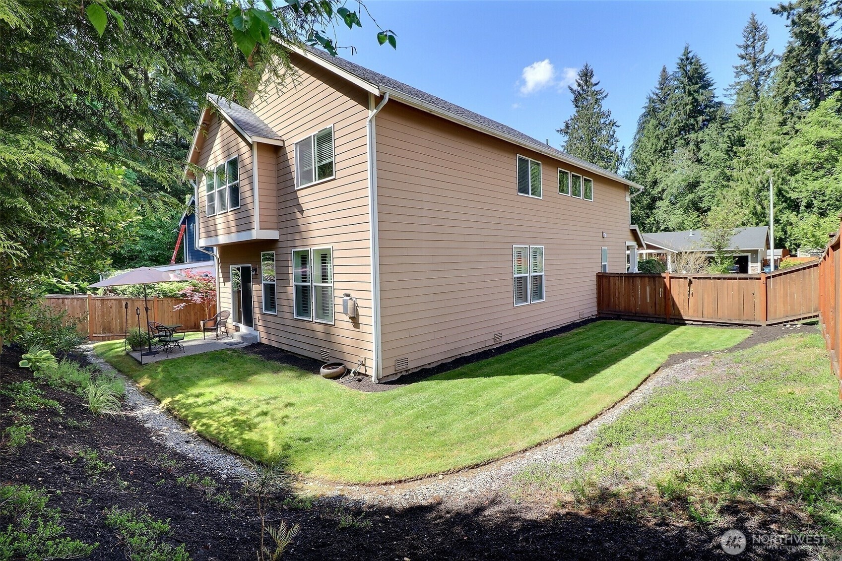 19776 Mountain Ridge Road Southeast Monroe, WA 98272 - Photo 34 of 40 a view of a house with a yard