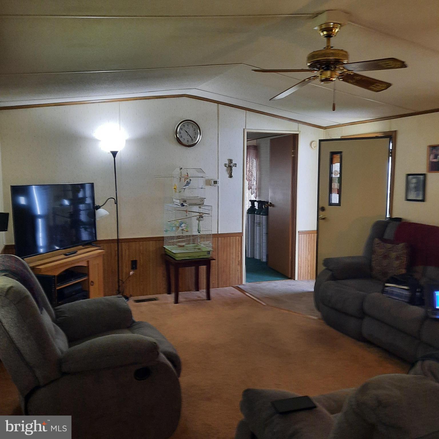 1047 Sage Avenue Reading, PA 19605 - Photo 2 of 8 a living room with furniture and a flat screen tv