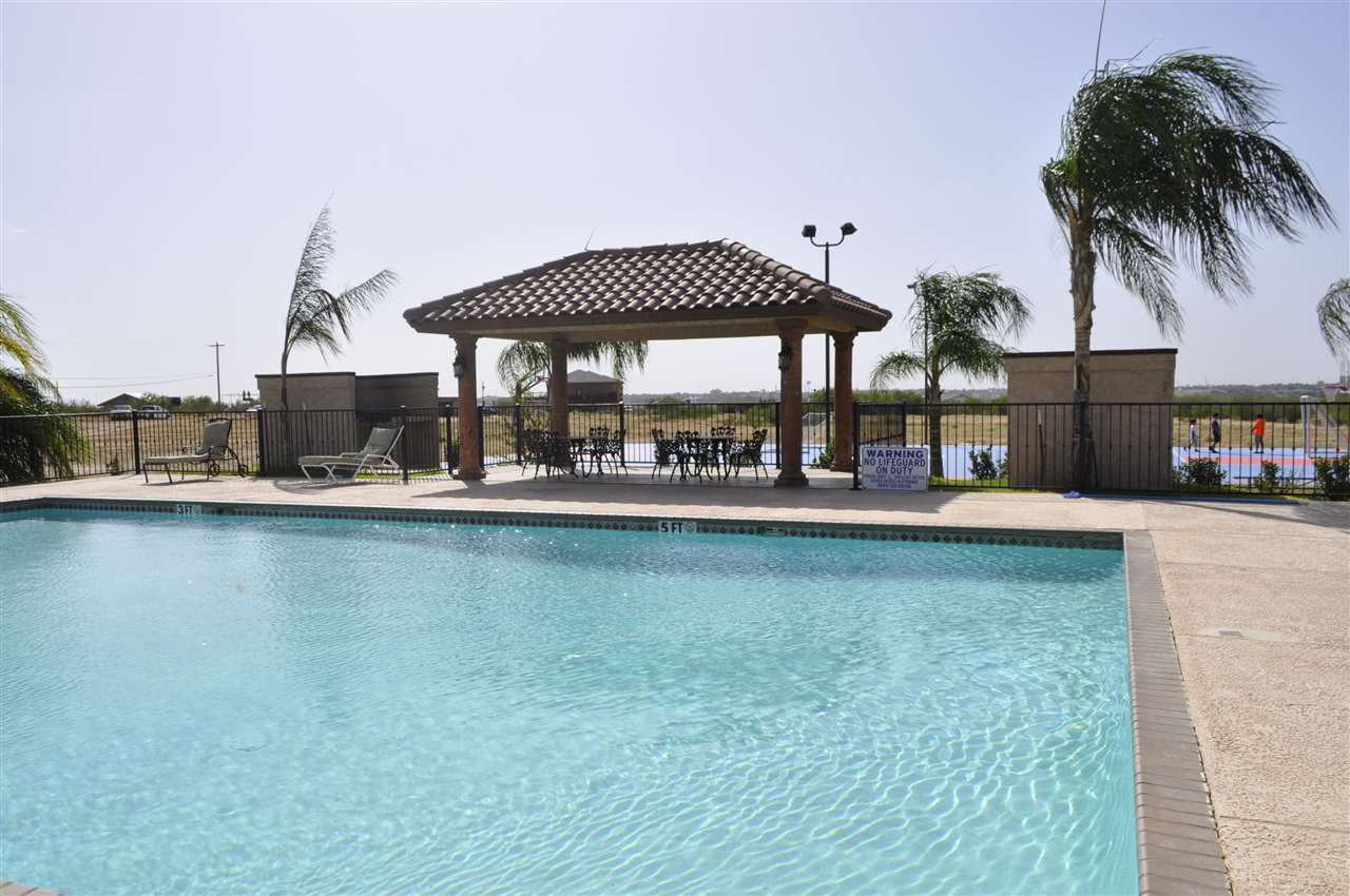 8216 Casa Verde Road, Unit E158 Laredo, TX 78041 - Photo 15 of 20 a swimming pool view with a outdoor space